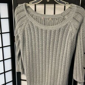 Gray sweater measures like a medium